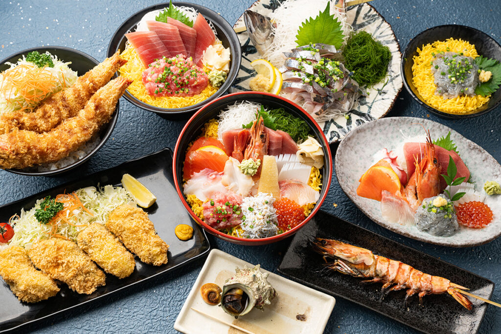 市場直送の新鮮魚介と海を見晴らす食堂